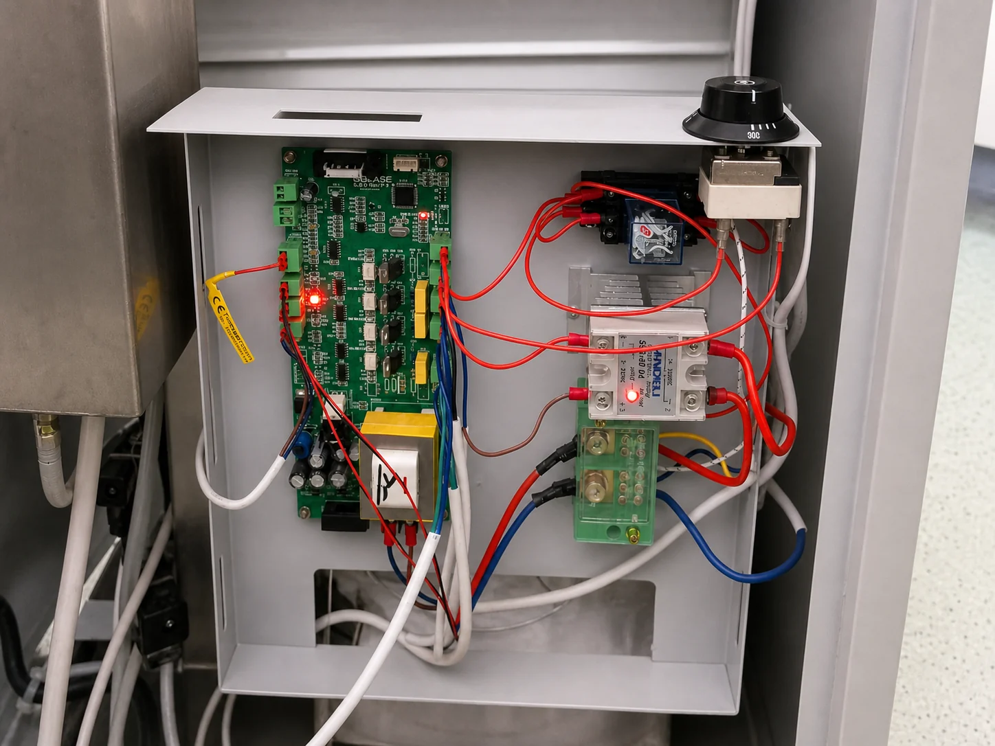 The restored control electronics inside a hospital autoclave